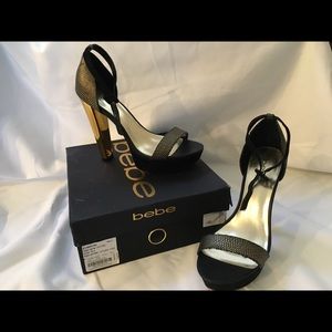 BLACK AND GOLD BEBE HEELS 👠